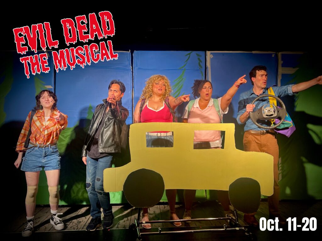 A shot of the cast in "Evil Dead: the Musical" standing behind a cutout of a yellow car.